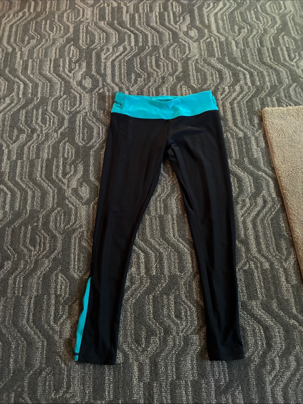 Avia Black Leggings with Turquoise Waistband and Ankle Accents